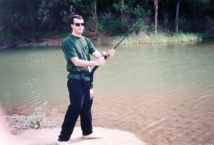 Picture of StrikeFighter with a trout rod.